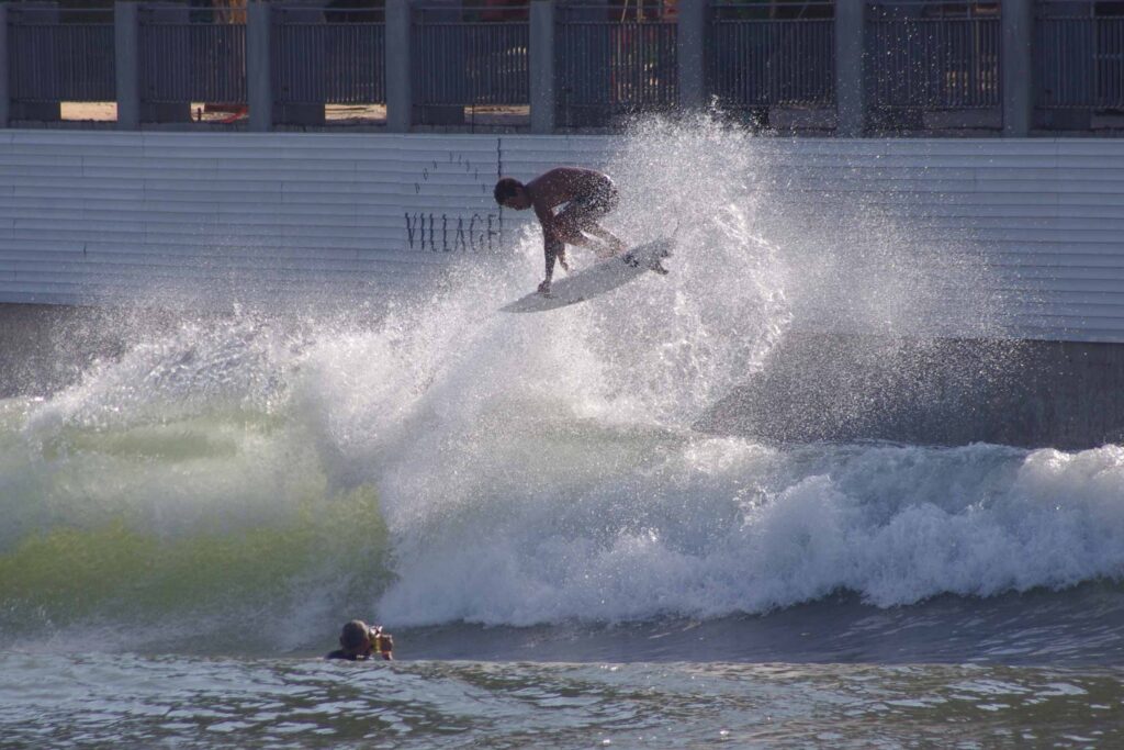 Samuel Pupo flying through the air in PerfectSwell Surf Pool