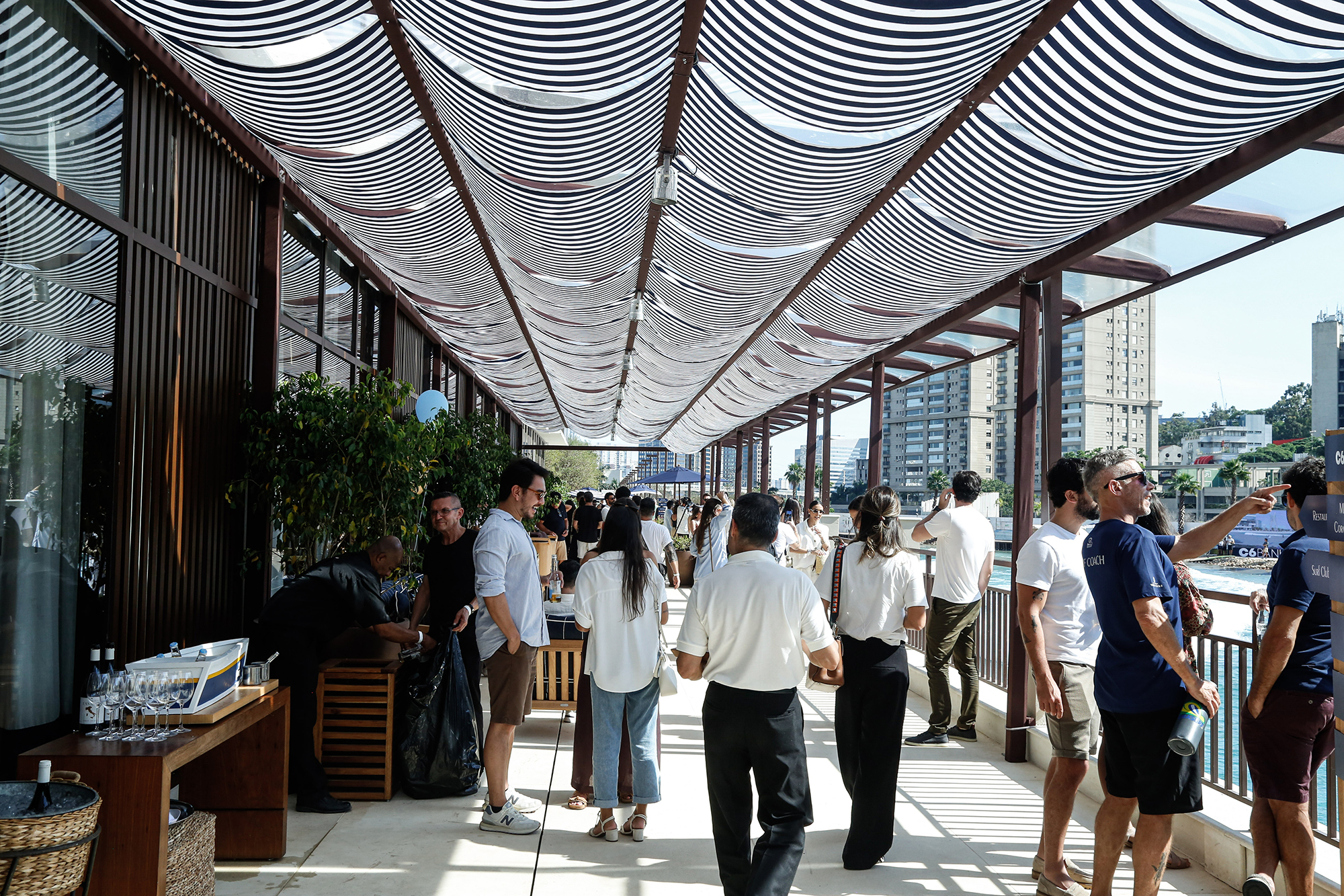 Members gather for an event at the exclusive perfectswell surf club in brazil